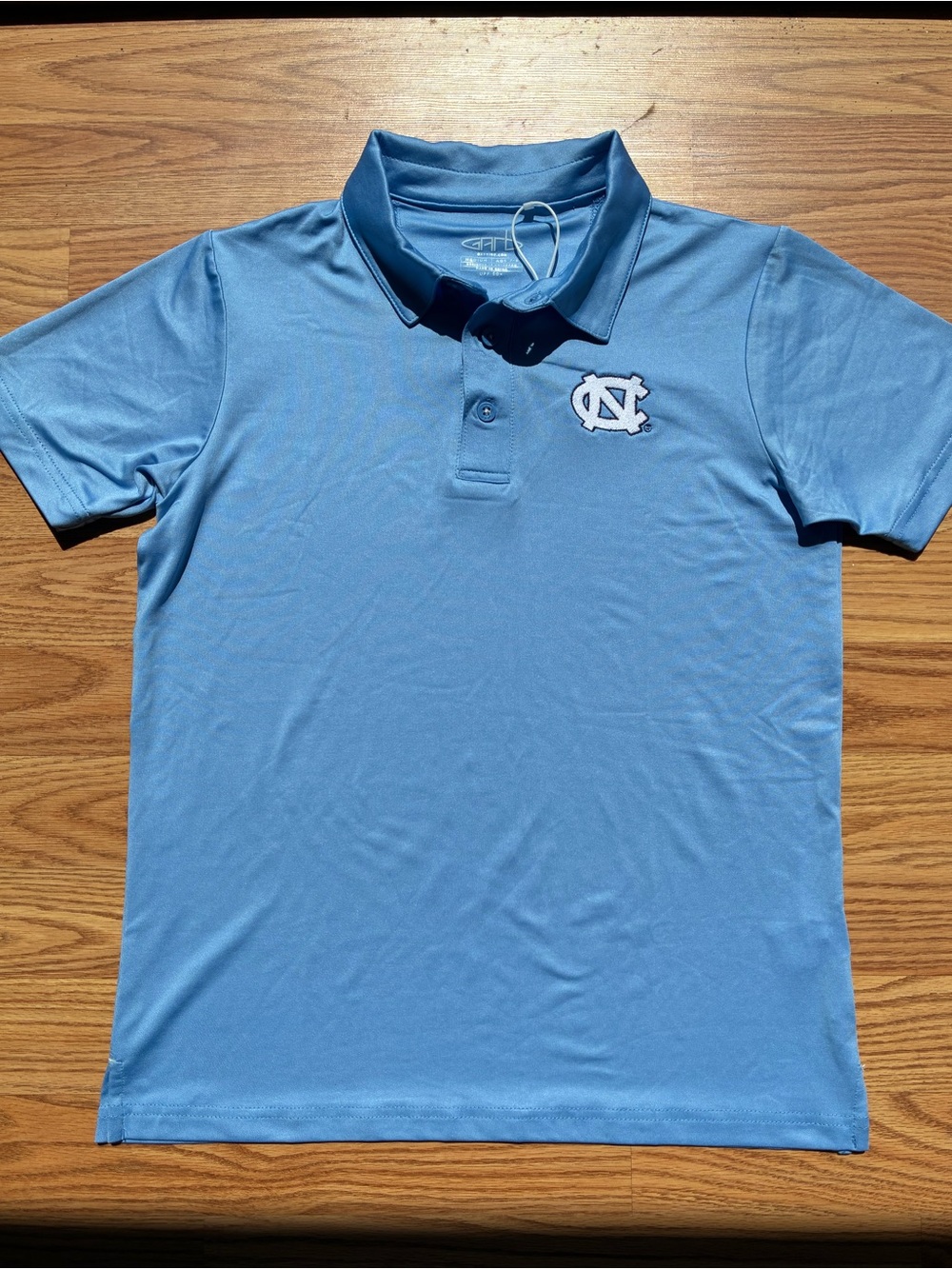 UNC Logo Boys Blue Polo - Size M (7-8)